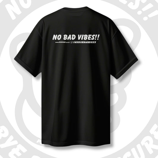 Black t-shirt with 'NO BAD VIBES!!' and japanese text on the back against a light grey artistic background.