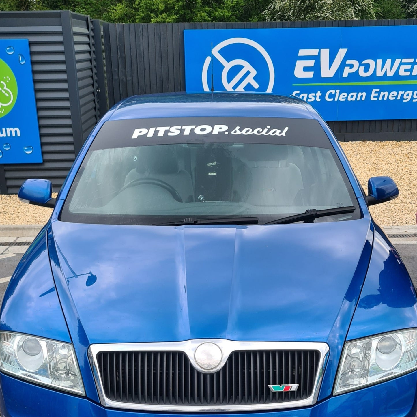 PITSTOP.Social Sunstrip White Text Black Background on Blue Skoda vrs Grille