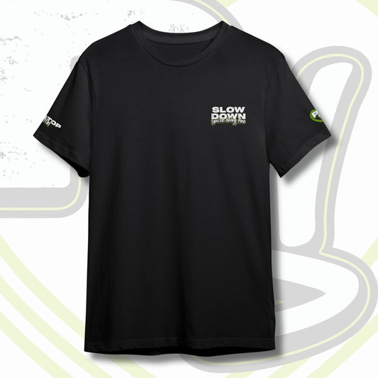 Black graphic t-shirt with graffiti text "SLOW DOWN You're Doing Fine" on front chest and PITSTOP.Social logo on sleeves