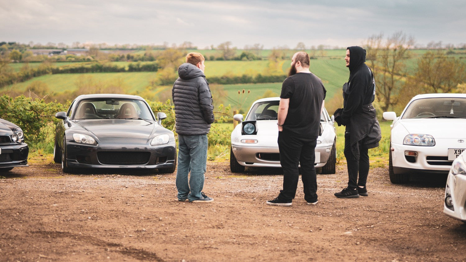 Mental Health Support and Resources Men Talking Cars