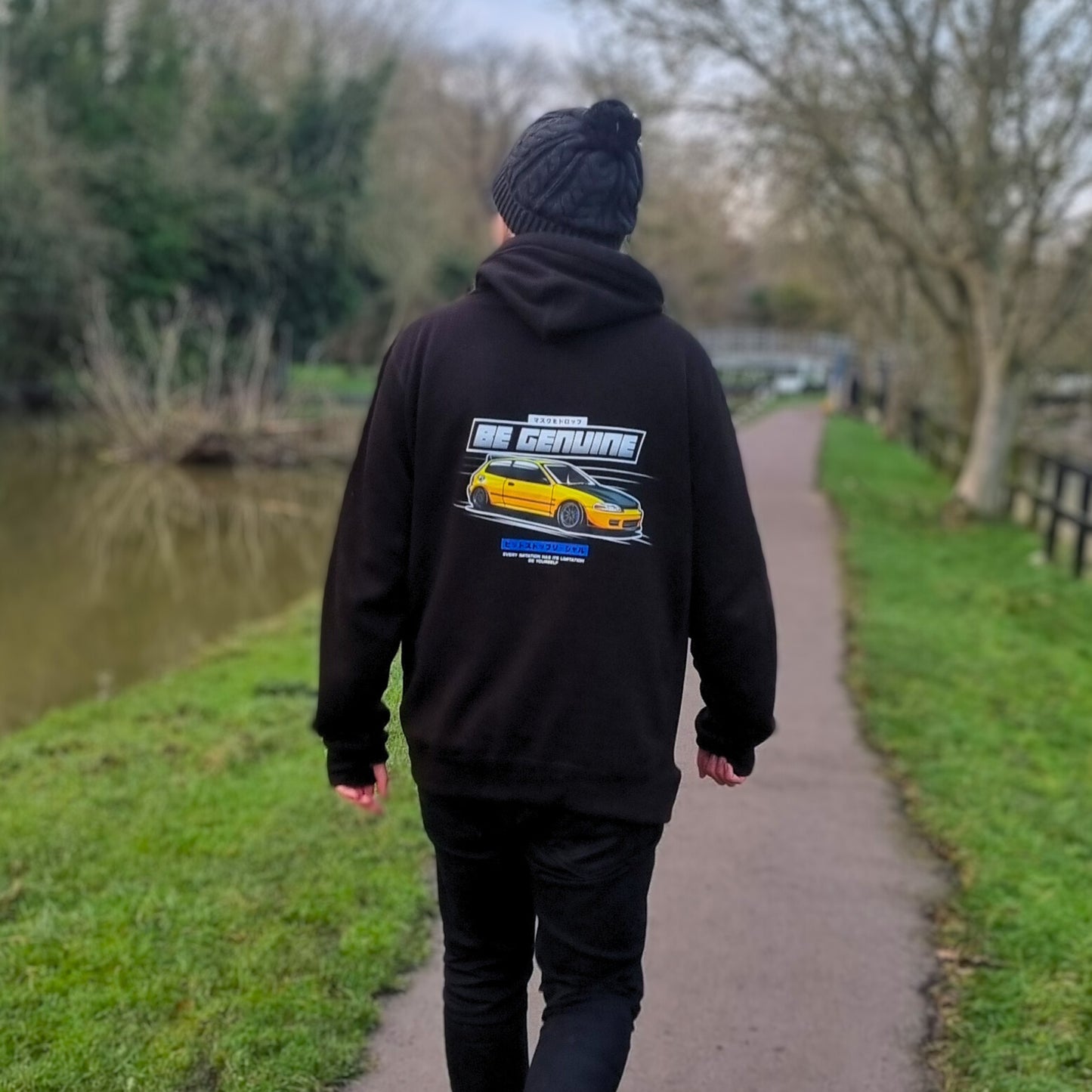 Be Genuine PITSTOP.Social black hoodie design featuring a yellow EG6 SiR Honda Civic in Drift Spec