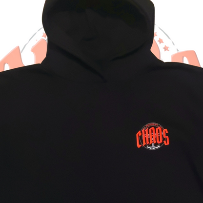 A black oversized box-fit premium hoodie with no cards and small chest logo 'DRIVEN BY CHAOS' printed in large red letters