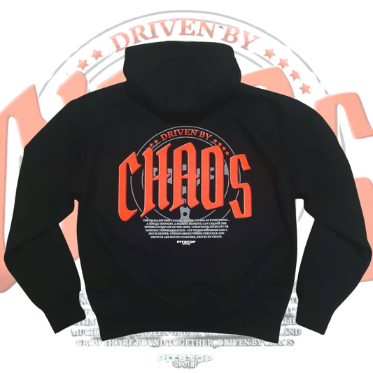 A black oversized box-fit premium hoodie with 'DRIVEN BY CHAOS' printed in large red letters within a car steering wheel on the back.