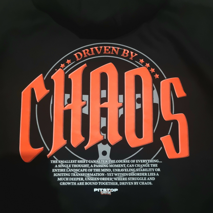A black oversized box-fit premium hoodie with 'DRIVEN BY CHAOS' printed in large red letters within a car steering wheel on the back, a close up with small text