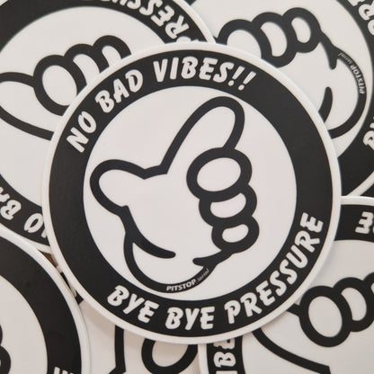 Sticker with 'No Bad Vibes!! Bye Bye Pressure' text and a hand gesture on a white background.