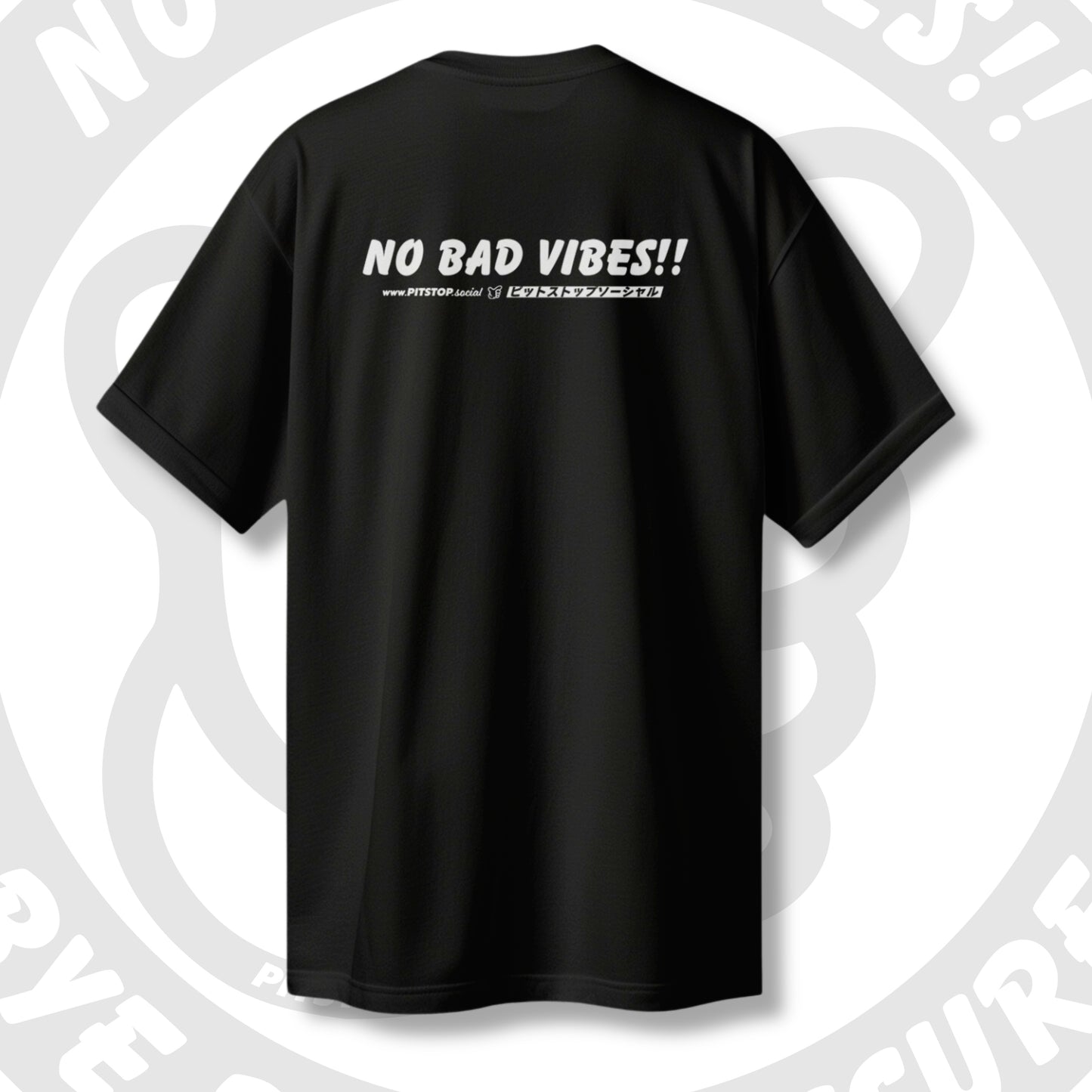 Black t-shirt with 'NO BAD VIBES!!' and japanese text on the back against a light grey artistic background.