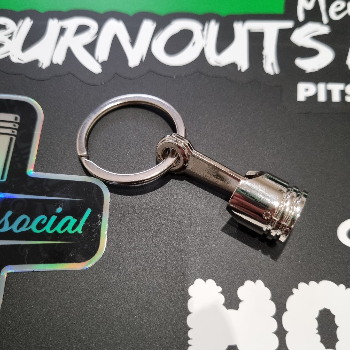 PITSTOP.Social solid metal piston key ring adult fidget toy