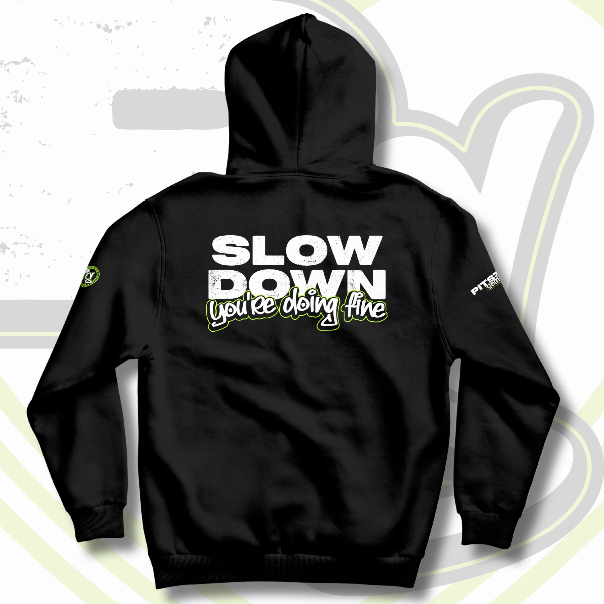 Black hoodie with the text 'SLOW DOWN You're doing fine' printed on the back in graffiti text with green outline